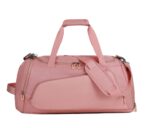 Pink waterproof gym duffel bag with shoulder strap for travel and fitness