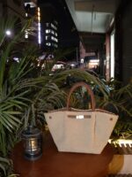 Plush sherpa tote handbag styled for an elevated evening look