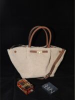 Plush sherpa tote bag styled casually for everyday use